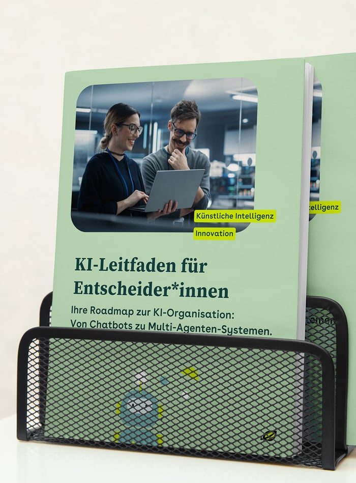 Buchcover des lise-Whitepapers ‚KI-Leitfaden für Entscheider*innen' in Mintgrün. Zwei Personen mit Brille schauen gemeinsam auf einen Laptop. Untertitel: ‚Ihre Roadmap zur KI-Organisation: Von Chatbots zu Multi-Agenten-Systemen.' Tags: Künstliche Intelligenz, Innovation." Buchcover des lise-Whitepapers ‚KI-Leitfaden für Entscheider*innen' in Mintgrün. Zwei Personen mit Brille schauen gemeinsam auf einen Laptop. Untertitel: ‚Ihre Roadmap zur KI-Organisation: Von Chatbots zu Multi-Agenten-Systemen.' Tags: Künstliche Intelligenz, Innovation."